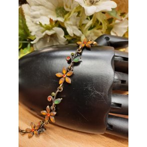 Armbnd med blomst og rde krystaller fra Dansk Smykkekunst 